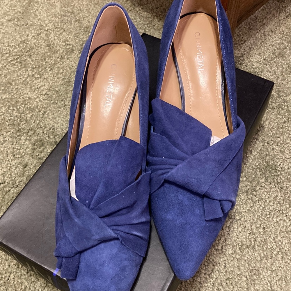 Navy blue suede pumps